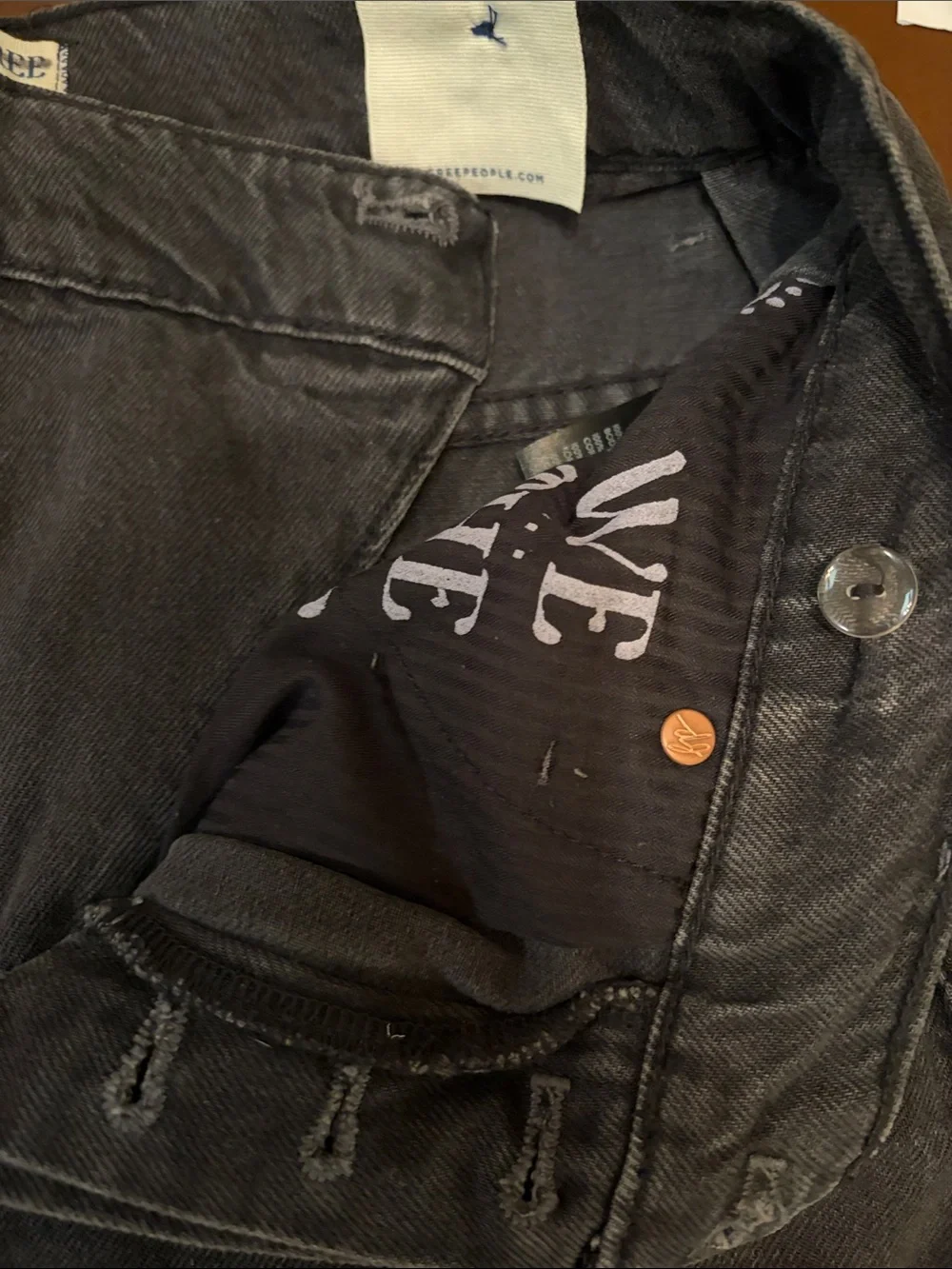 We The Free, boomerang Black Jean Shorts missing one top copper rivet. - Picture 8 of 15